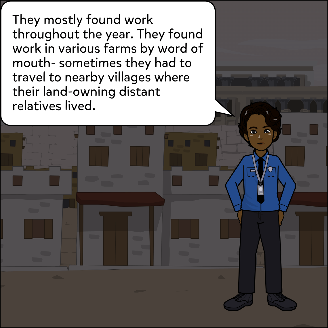 Ajay stands in front of a row of dark, shuttered low village buildings, hands clasped behind his back, speaking with a steady, matter-of-fact expression.